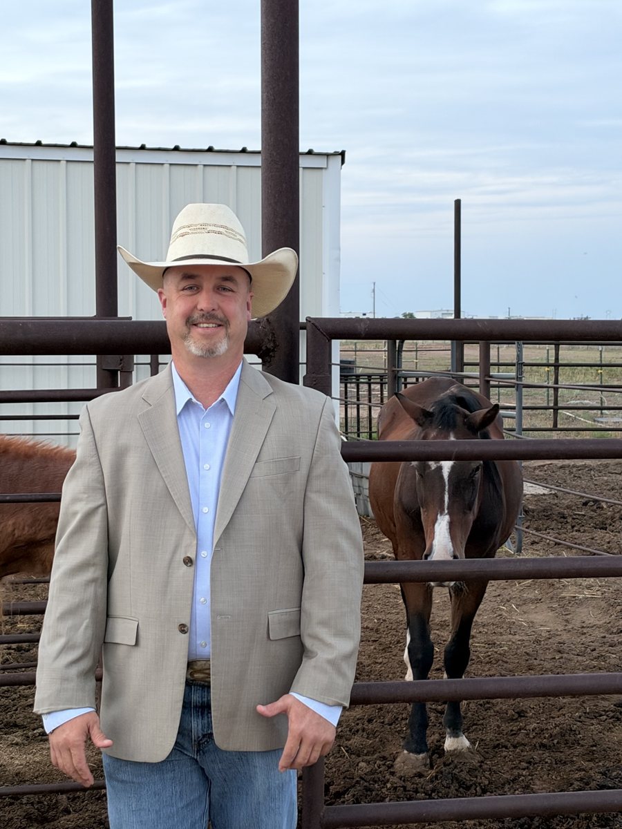 Kyle Ellison with his mare Lady at the family ranch pens, Texas Panhandle.